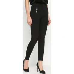 Czarne Legginsy Indicated. Czarne legginsy damskie Born2be, xl, bez wzorów. Za 49,99 zł.
