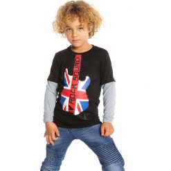 Koszulka w kolorze czarno-szarym. Szare t-shirty chłopięce La Petit Parisienne, z nadrukiem, bez rękawów. W wyprzedaży za 77,95 zł.