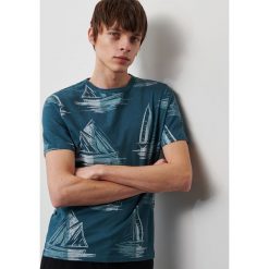 T-shirt z nadrukiem - Turkusowy. Niebieskie t-shirty damskie Reserved, s, z nadrukiem, bez kołnierzyka. Za 39,99 zł.