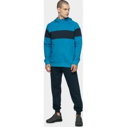 Spodnie męskie dresowe SPMD600 - ciemny granat - Outhorn. Spodnie męskie Outhorn, na imprezę, m, bez wzorów, z dresówki. Za 89,99 zł.