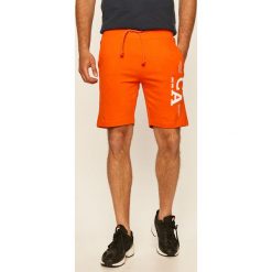 Produkt by Jack & Jones - Szorty. Pomarańczowe spodenki i szorty męskie PRODUKT by Jack & Jones, s, z nadrukiem, z bawełny, casualowe. W wyprzedaży za 79,90 zł.