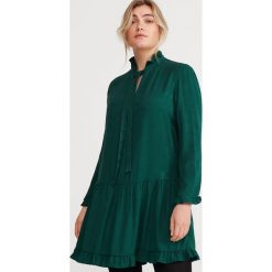 Sukienka z żakardowej tkaniny - Turkusowy. Niebieskie sukienki damskie Reserved, bez wzorów, z tkaniny, bez kołnierzyka, bez rękawów. Za 159,99 zł.
