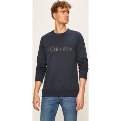 Columbia - Bluza. Niebieskie bluzy męskie Columbia, s, z aplikacjami, z elastanu, z okrągłym kołnierzem, bez rękawów, bez kaptura. Za 199,90 zł.