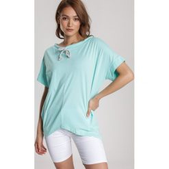 Miętowa Bluzka Rhenephine. Zielone bluzki damskie Renee, xl, bez wzorów, bez kołnierzyka, bez rękawów. Za 59,99 zł.
