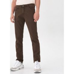 Spodnie slim fit - Brązowy. Pomarańczowe spodnie męskie House, s, bez wzorów. Za 89,99 zł.