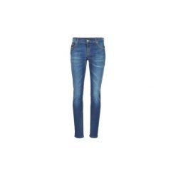 Jeansy slim fit Versace Jeans Couture V PAVE STUDS. Niebieskie jeansy damskie Versace Jeans Couture, bez wzorów, z jeansu. W wyprzedaży za 551,40 zł.