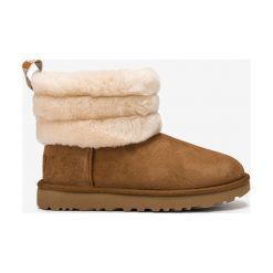 UGG Fluff Mini Śniegowce Brązowy. Pomarańczowe śniegowce damskie Ugg, na zimę, ze skóry, bez zapięcia. Za 895,95 zł.