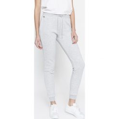 Lacoste - Spodnie. Szare spodnie damskie Lacoste, z bawełny. Za 349,90 zł.