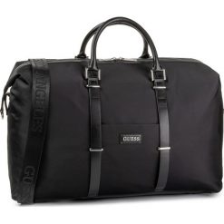 Torba GUESS - New Milano Travel TM6922 PL201 BLA. Czarne torby męskie skórzane Guess, z aplikacjami, z materiału. Za 739,00 zł.