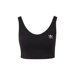 Topy na ramiączkach / T-shirty bez rękawów adidas Krótka koszulka Styling Complements. Czarne koszulki damskie Adidas, bez wzorów, bez kołnierzyka, z krótkim rękawem. Za 90,30 zł.