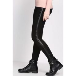 Czarne Legginsy Unseasoned. Czarne legginsy damskie Born2be, xl, bez wzorów, z dzianiny. Za 44,99 zł.