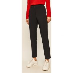 Tommy Hilfiger - Spodnie. Niebieskie spodnie damskie TOMMY HILFIGER, bez wzorów, z elastanu. W wyprzedaży za 339,90 zł.
