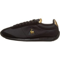 Sneakersy "Quartz Metallic" w kolorze czarno-złotym. Czarne sneakersy męskie le coq sportif, bez wzorów, na sznurówki. W wyprzedaży za 215,95 zł.