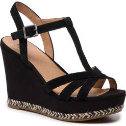 Espadryle UGG - W Melissa 1102807 W/Blk. Czarne espadryle damskie Ugg, bez wzorów, ze skóry, bez obcasa, na obcasie. W wyprzedaży za 419,00 zł.