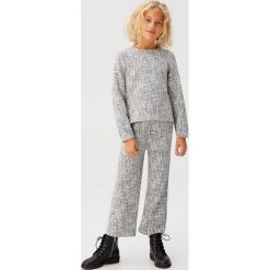 Mango Kids - Bluza dziecięca Gema 110-164 cm. Białe bluzy dziewczęce Mango Kids, bez wzorów, z bawełny, bez rękawów, bez kaptura. Za 69,90 zł.