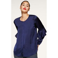 Bluzka Persona by Marina Rinaldi Chemise 1111200. Niebieskie bluzki damskie Persona by Marina Rinaldi, bez wzorów, z poliesteru, marine, bez kołnierzyka, bez rękawów. Za 579,00 zł.