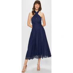 Tommy Hilfiger - Sukienka. Niebieskie sukienki damskie TOMMY HILFIGER, na co dzień, w koronkowe wzory, z elastanu, casualowe, bez kołnierzyka, bez rękawów, rozkloszowane. Za 1299,00 zł.