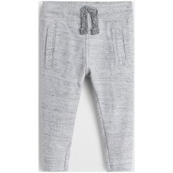 Mango Kids - Spodnie dziecięce Jumbi5 80-104. Szare spodnie chłopięce Mango Kids, bez wzorów, z bawełny, casualowe. Za 45,90 zł.