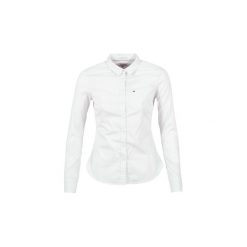 Koszule Tommy Jeans YAPAD. Białe koszule damskie Tommy Jeans, s, bez wzorów, z jeansu, bez kołnierzyka, bez rękawów. Za 229,53 zł.