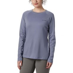 Koszulka Columbia Windgates™ LS Tee 1885801556. Niebieskie koszulki damskie Columbia, l, bez wzorów, bez kołnierzyka. Za 156,99 zł.