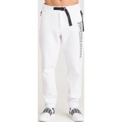 SPODNIE DRESOWE ARMANI EXCHANGE. Białe spodnie męskie Armani Exchange, na imprezę, s, z nadrukiem, z dresówki. Za 335,00 zł.