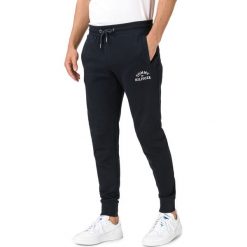 Tommy Hilfiger Spodnie dresowe Niebieski. Niebieskie spodnie męskie TOMMY HILFIGER, l, z haftami, z bawełny. Za 514,95 zł.