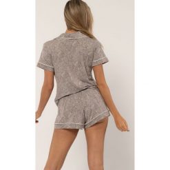 Dorina - T-shirt piżamowy Stephane. Pomarańczowe piżamy damskie Dorina, s, bez wzorów, z elastanu, bez rękawów. Za 119,90 zł.