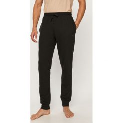 Emporio Armani - Spodnie. Szare spodnie męskie Emporio Armani, na co dzień, s, bez wzorów, z elastanu. Za 359,90 zł.