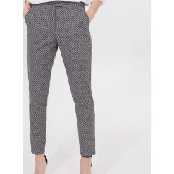 Spodnie cygaretki short length - Niebieski. Niebieskie spodnie damskie Mohito. W wyprzedaży za 39,99 zł.