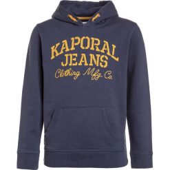 Kaporal ROWOK Bluza z kapturem blueus. Niebieskie bluzy chłopięce marki Kaporal, z bawełny, z kapturem. W wyprzedaży za 170,10 zł.