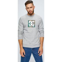 DC - Bluza. Szare bluzy męskie DC, s, z nadrukiem, z elastanu, z okrągłym kołnierzem, bez rękawów, bez kaptura. W wyprzedaży za 199,90 zł.