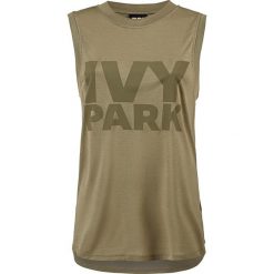 Top w kolorze khaki. Brązowe bluzki damskie Street & Sports Wear, xs, z nadrukiem, z okrągłym kołnierzem, bez rękawów. W wyprzedaży za 55,95 zł.
