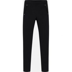 Mayoral - Legginsy dziecięce 128-167 cm. Czarne spodnie dziewczęce Mayoral, bez wzorów, z elastanu, casualowe. W wyprzedaży za 84,90 zł.
