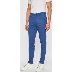 Jack & Jones - Spodnie Marco. Niebieskie spodnie męskie Jack & Jones, na co dzień, bez wzorów, z elastanu, casualowe. W wyprzedaży za 79,90 zł.