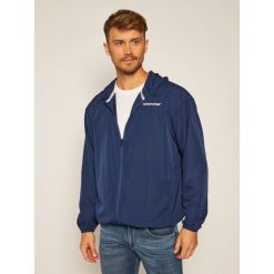Wiatrówka Tommy Sport Logo S20S200355. Niebieskie kurtki sportowe męskie Tommy Sport, s, bez wzorów, bez kaptura, do biegania. Za 399,00 zł.