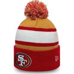 New Era San Francisco Czapka zimowa Czerwony Żółty. Czerwone czapki męskie New Era, na zimę, z aplikacjami, z materiału. Za 128,95 zł.