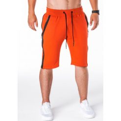Krótkie spodenki męskie dresowe W054 - pomarańczowe. Pomarańczowe spodenki i szorty męskie Ombre Clothing, s, bez wzorów, z bawełny, krótkie. Za 29,00 zł.