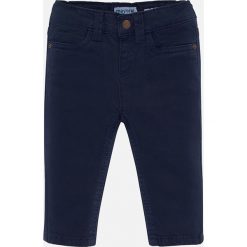 Mayoral - Spodnie dziecięce 80-98 cm. Żółte spodnie chłopięce Mayoral, bez wzorów, z elastanu. W wyprzedaży za 59,90 zł.