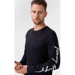 Tommy Hilfiger Signature Koszulka Niebieski. Niebieskie podkoszulki męskie TOMMY HILFIGER, l, z nadrukiem, z bawełny, z krótkim rękawem. Za 292,95 zł.