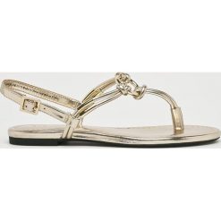 Armani Exchange - Sandały. Żółte klapki damskie marki Armani Exchange, bez wzorów, z materiału, bez obcasa, na szpilce. Za 559,90 zł.