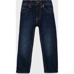 Blukids - Jeansy dziecięce 98-134 cm. Niebieskie spodnie chłopięce Blukids, bez wzorów, z elastanu. W wyprzedaży za 24,90 zł.