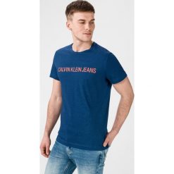 Calvin Klein Koszulka Niebieski. Niebieskie podkoszulki męskie Calvin Klein, l, bez wzorów, z bawełny, z krótkim rękawem. Za 152,95 zł.
