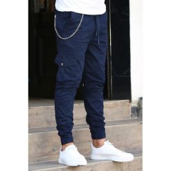 Spodnie męskie CALEB NAVY. Niebieskie jeansy męskie Spodnie męskie CALEB NAVY, s, bez wzorów, sportowe. W wyprzedaży za 119,00 zł.