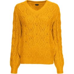 Sweter ażurowy bonprix żółty szafranowy. Żółte swetry damskie bonprix, bez wzorów, bez rękawów, bez kaptura. Za 99,99 zł.