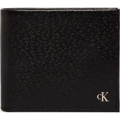 Calvin Klein Jeans - Portfel skórzany. Czarne portfele męskie Calvin Klein Jeans, bez wzorów, z jeansu. W wyprzedaży za 219,90 zł.