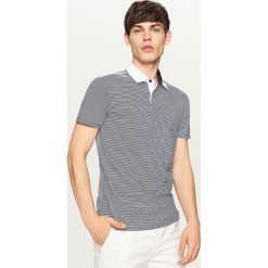 Koszulka polo w paski - Granatowy. Niebieskie koszulki polo marki Reserved, m, w paski. W wyprzedaży za 29,99 zł.
