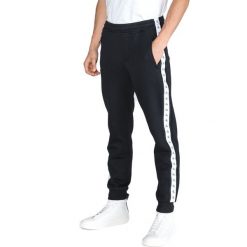 Calvin Klein Monogram Spodnie dresowe Czarny. Czarne spodnie męskie xl, z bawełny. Za 330,95 zł.