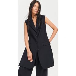 Elegancka kamizelka z wełną - Granatowy. Niebieskie kamizelki damskie Reserved, bez wzorów, z wełny, eleganckie, bez kaptura. Za 349,99 zł.