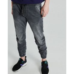 Jeansy slim jogger - Szary. Szare jeansy męskie Cropp, m, bez wzorów. Za 119,99 zł.