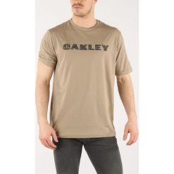 Oakley Camo Koszulka Brązowy. Pomarańczowe podkoszulki męskie Oakley, s, z nadrukiem, z bawełny, bez kołnierzyka, z krótkim rękawem, krótkie. Za 83,95 zł.